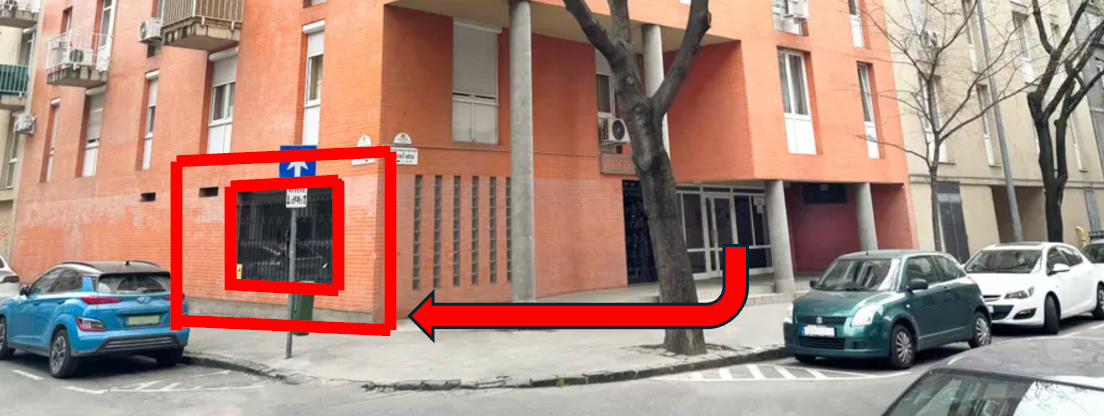 Door left from the postboxes